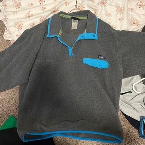 Men’s gray and blue Patagonia fleece pullover. Decent used condition